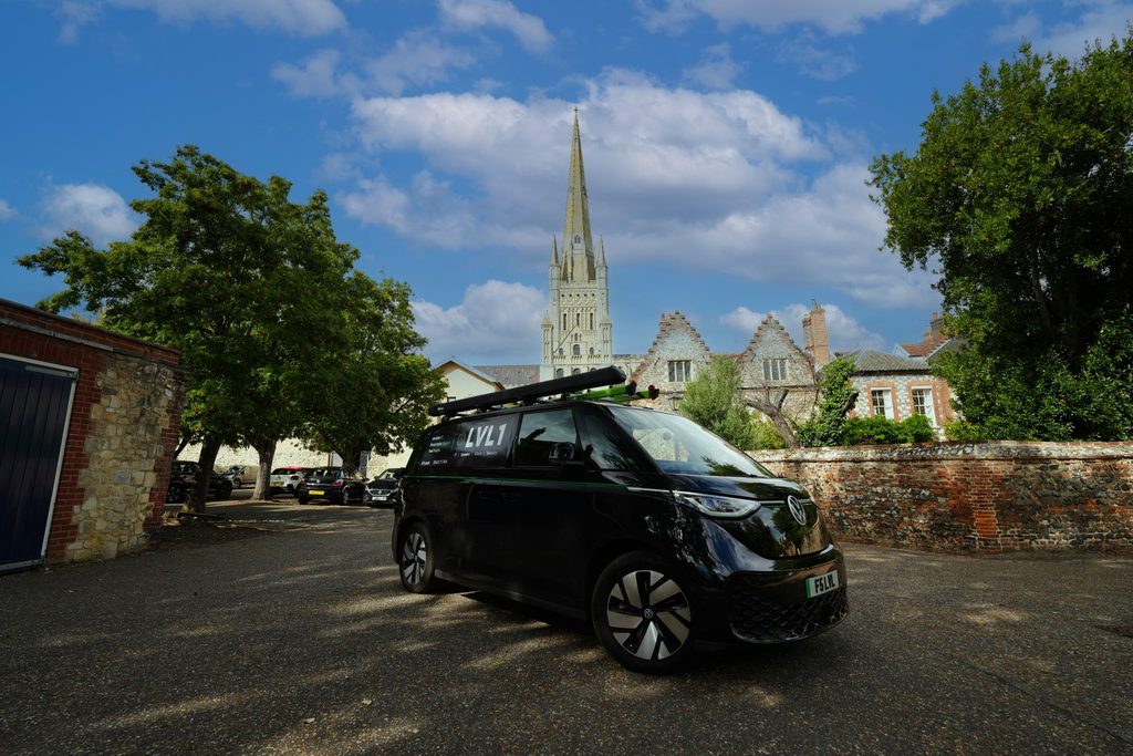 LVL1 Volkswagen ID. Buzz with Norwich Cathedral visible in the background